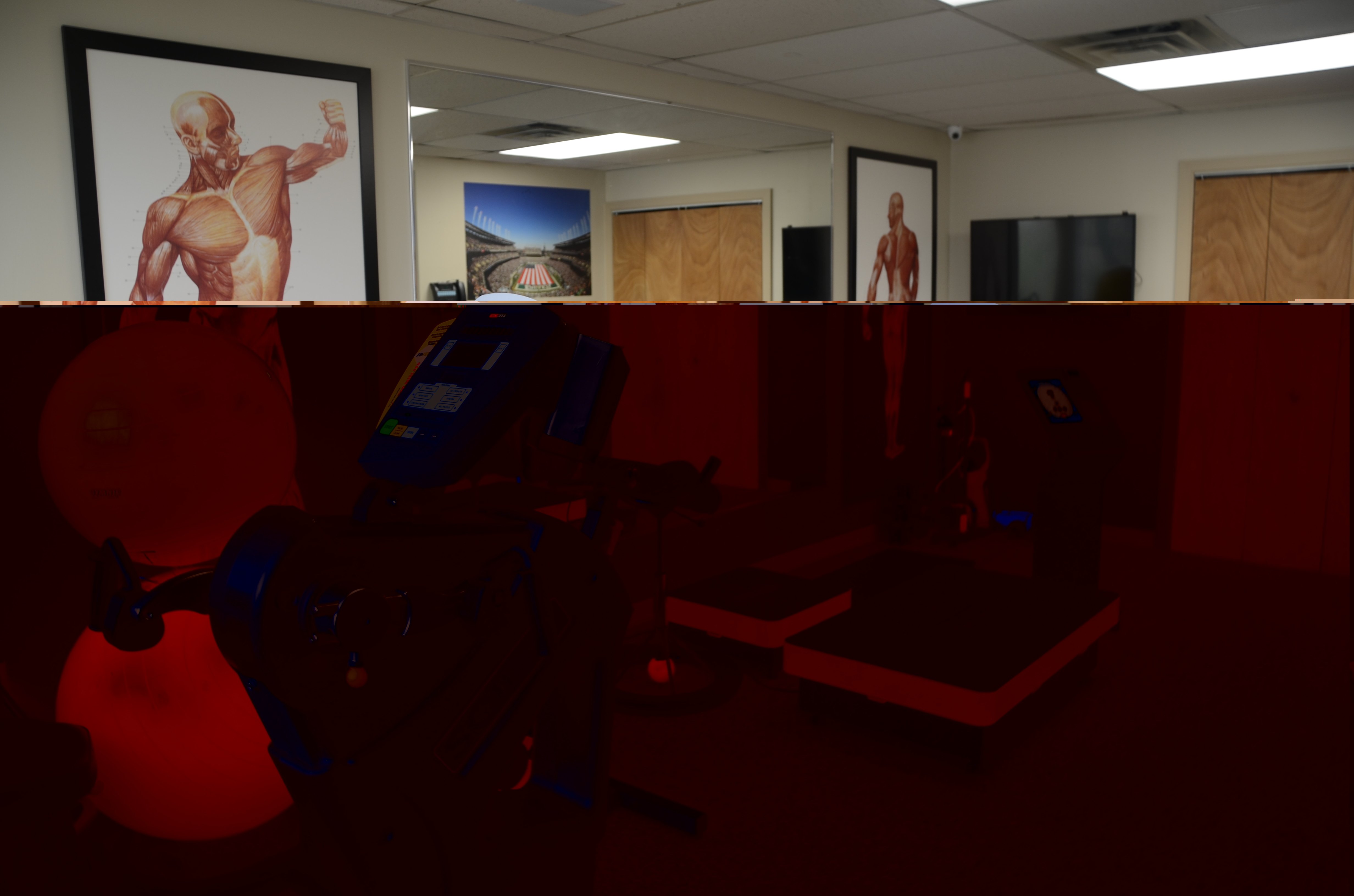 Interior view of a clinical or therapy room with professional equipment