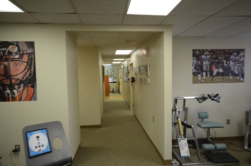 A bright, clean hallway inside a medical or clinical facility