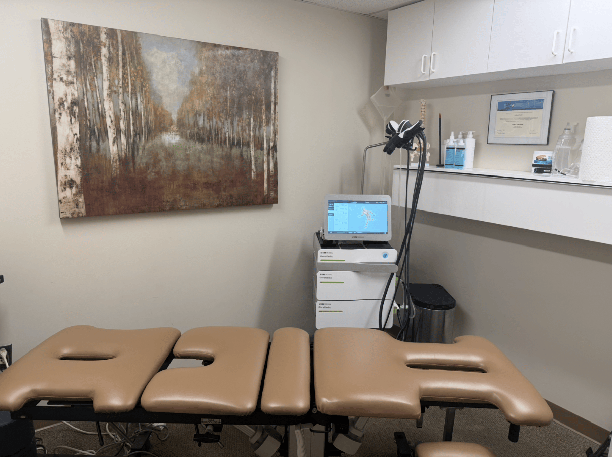 Full view of shockwave therapy session in a clinical setting